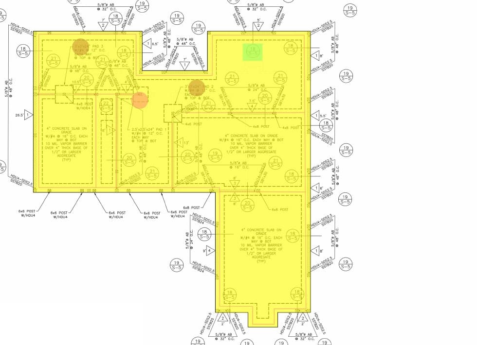 Foundation plan with the concrete slab shaded yellow, footings traced in magenta and pad footings marked, as delivered to the client